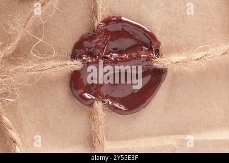 Siegelwachs auf antikem Papier Stockfoto