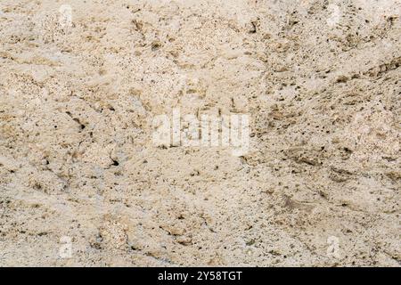 Architektonischer Hintergrund, Textur, Wandfläche aus hellem Stein Stockfoto