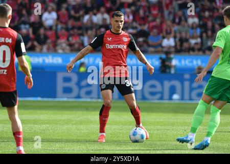 Leverkusen, Deutschland. September 2024. Fussball; Spieltag 04; 1. Bundesliga; Saison 2024/2025; Bayer Leverkusen gegen VfL Wolfsburg am 22.09.2024 in Leverkusen. UBz: 34 Granit Xhaka, Bayer Leverkusen. Quelle: dpa/Alamy Live News Stockfoto