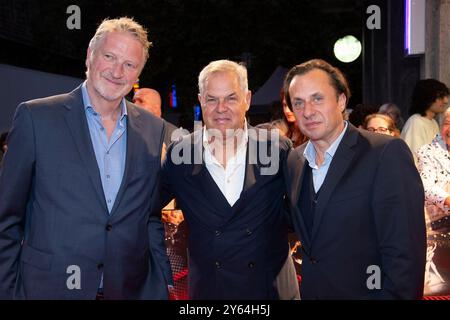 Essen, Deutschland. September 2024. Von links nach rechts Produzent Michael SOUVIGNIER, Regisseur Joachim LANG, Produzent Till DERENBACH, Filmpremiere CRANKO in der Lichtburg in Essen, 23. September 2024. Quelle: dpa/Alamy Live News Stockfoto