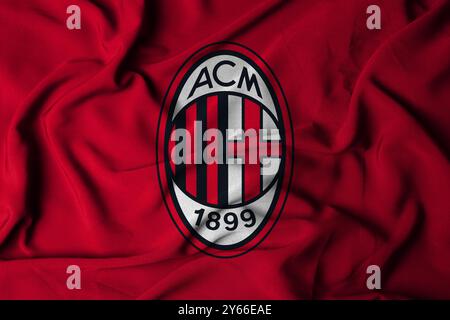 Pringsewu, Lampung 24. September 2024; selektive Focus-Flaggenlogostruktur mit AC Milan Hintergrund. Italienische Fußballvereinsflagge der Serie A. 3D-Abbildung Stockfoto