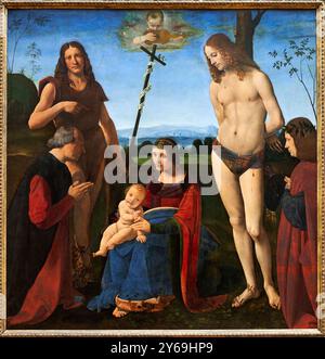 Die Jungfrau und das Kind mit dem heiligen Johannes dem Täufer und dem heiligen Sebastian und zwei Spendern, bekannt als Pala Casio, Öl auf Platte, 1500, Giovanni Antonio Boltraffic, Mailand, 1467 - Mailand, 1516, Musée du Louvre, Paris, Frankreich. Stockfoto