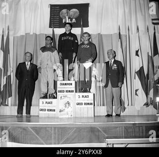 WORLD AMATEUR WRESTLING CHAMIPNSHIPS IN TOLEDO - KAMEL ALI , MASAMITSU ICHIGUCHI UND AMARI EGADSE / ; 3. JULI 1962 Stockfoto