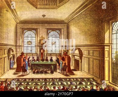 Lotteriezeichnung in der Coopers Hall, 1809. Ein Abdruck aus The Microcosm of London von William Henry Pyne (1770–1843). Illustriert von Thomas Rowlandson (1756–1827) und Auguste Charles Pugin (1762–1832). Staatliche Lotterien wurden von der Bank of England gegründet, um Geld für „gute Zwecke“ zu generieren und Großbritannien zu ermöglichen, kriegsbereit zu sein. Zu den frühen englischen Staatslotterien zählten die Million Lottery (1694) und die Malt Lottery (1697). Stockfoto