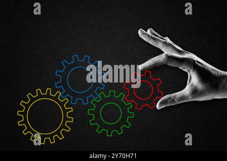 Hand Turning Gear Schild in Schwarz-weiß auf strukturiertem Papier Hintergrund, Kopierraum Stockfoto