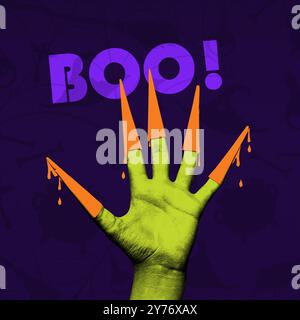 Grüne Monsterhand mit langen orangefarbenen Klauen vor dunkelviolettem Hintergrund mit Wortbuch. Alptraum. Kreative Collage. Stockfoto