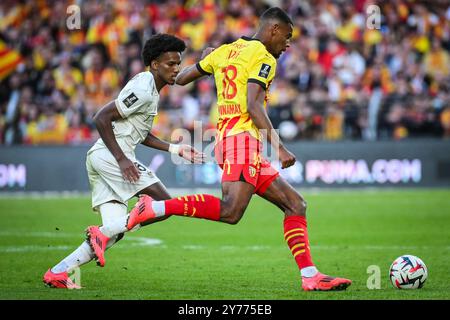 Hicham BOUDAOUI von Nizza und Andy DIOUF von Lens während des französischen Meisterschaftsspiels Ligue 1 zwischen RC Lens und OGC Nice am 28. September 2024 im Bollaert-Delelis Stadion in Lens, Frankreich Stockfoto