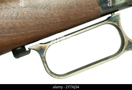 Handschlaufe und Schlaufenfänger in Farbe, die in einem mit Holz gefüllten Hebelgriff-Gewehr verwendet werden, das oft in Filmen des alten Westens verwendet wird. Stockfoto