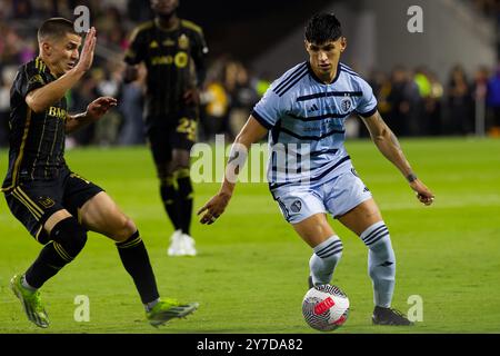 BMO Stadium, Kalifornien, USA. September 2024. LAFC gewinnt den Lamar Hunt Open Cup 2024. Abgebildet ist der KC-Stürmer ALAN PULIDO #9 (Mitte-r), der die Offensive während der Überstunden im BMO Stadium in Los Angeles, KALIFORNIEN, am 25. September 2024 anführte. (Kreditbild: © Serena S.Y. Hsu/ZUMA Press Wire) NUR REDAKTIONELLE VERWENDUNG! Nicht für kommerzielle ZWECKE! Stockfoto