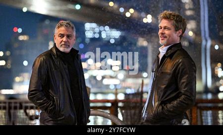 GEORGE CLOONEY und BRAD PITT in WOLFS (2024), Regie führte JON WATTS. Guthaben: PLAN B UNTERHALTUNG/Album Stockfoto