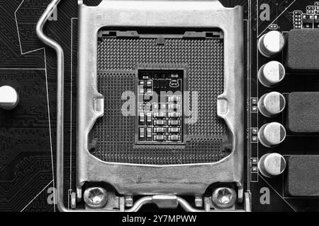 Leerer CPU-Sockel auf dem Hauptplatinenhintergrund für Design in Ihrem Arbeitscomputer-Konzept. Stockfoto