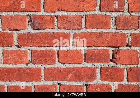 Close up photo of an old red brick wall. Stockfoto