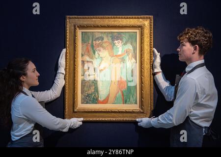 London, England, Großbritannien. Oktober 2024. Christies Techniker halten La femme tatouee von Henri de Toulouse-Lautrec während einer Pressevorschau für den Londoner Abendverkauf des 20./21. Jahrhunderts bei Christie's. Das Kunstwerk hat einen Wert von 2.500.000 GBP 3.500.000 und wird am 9. Oktober 2024 versteigert. (Kreditbild: © Thomas Krych/ZUMA Press Wire) NUR REDAKTIONELLE VERWENDUNG! Nicht für kommerzielle ZWECKE! Stockfoto