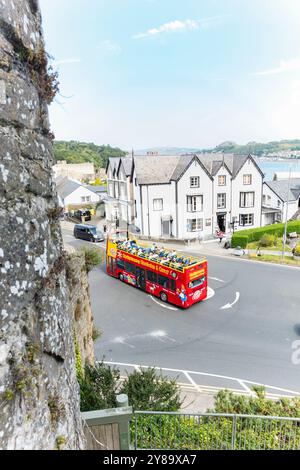 Conwy Wales - July 31 2024; Tourist bus driving around roundabout below Conwy Castle. Stockfoto