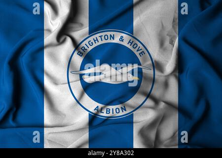 Pringsewu, Lampung; 5. Oktober 2024; Brighton & Hove Albion Football Club Selective Focus Flagge Logo Textur Hintergrund, 3D Illustration Stockfoto