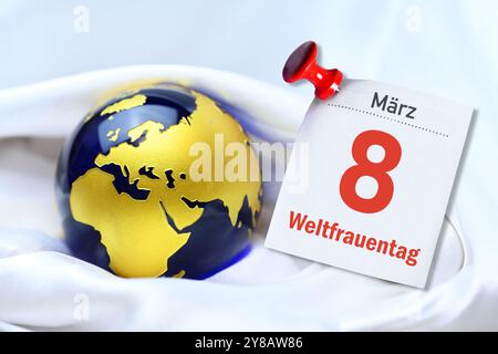 FOTOMONTAGE, Kalenderseite vom 8. März und Globe, symbolisches Foto vom Internationalen Frauentag, FOTOMONTAGE, Kalenderblatt vom 8. März. März und Weltkug Stockfoto