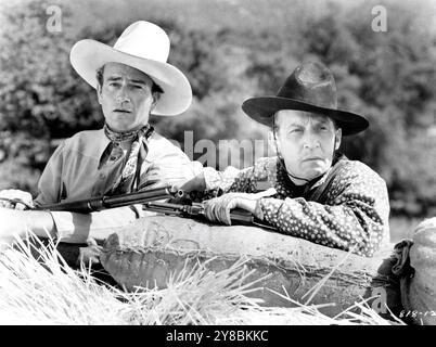 JOHN WAYNE und RAYMOND HATTON in dem NEUEN FRONTIER 1939 Regisseur GEORGE SHERMAN musizieren William Lava Republic Pictures Stockfoto