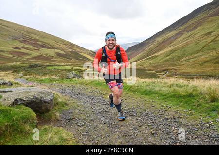 Trailläufer, die an 13 Valleys Ultra Marathon, Lake District, Cumbria, Großbritannien teilnehmen Stockfoto