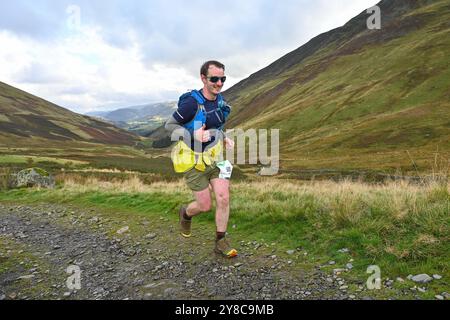 Trailläufer, die an 13 Valleys Ultra Marathon, Lake District, Cumbria, Großbritannien teilnehmen Stockfoto