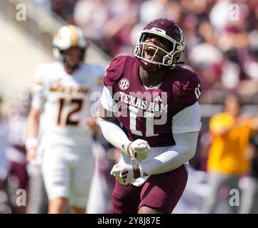 College Station, Texas, USA. Oktober 2024. Der Texas A&M Defensive Lineman NIC Scourton (11) reagiert, nachdem er am 5. Oktober 2024 in College Station, Texas, ein Niederlage-Spiel zwischen den Texas A&M Aggies und den Missouri Tigers gemacht hat. (Kreditbild: © Scott Coleman/ZUMA Press Wire) NUR REDAKTIONELLE VERWENDUNG! Nicht für kommerzielle ZWECKE! Quelle: ZUMA Press, Inc./Alamy Live News Stockfoto