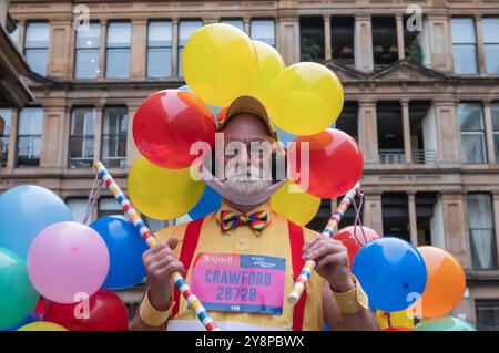 Glasgow, Schottland, Großbritannien. Oktober 2024. Der jährliche Great Scottish Run bricht frühere Rekorde mit 30.000 Menschen, die bei einem 10-km- oder Halbmarathon auf die Straßen der Stadt fahren. Quelle: Skully/Alamy Live News Stockfoto