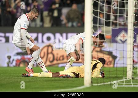 Florenz, Italien. Oktober 2024. Mailand-Spieler Mike Maignan spart während des Spiels der Serie A Enilive 2024/2025 zwischen Fiorentina und Mailand – Serie A Enilive im Artemio Franchi Stadion – Sport, Fußball – Florenz, Italien – Sonntag, 6. Oktober 2024 (Foto: Massimo Paolone/LaPresse) Credit: LaPresse/Alamy Live News Stockfoto