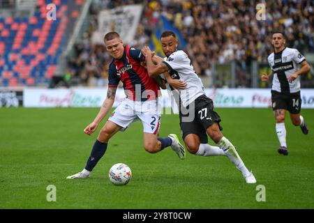 Holm Emil (Bologna FC) im Gegenzug von Hernani Azevedo (Parma Calcio) beim Spiel Bologna FC gegen Parma Calcio, italienische Fußball-Serie A in Bologna, Italien, 06. Oktober 2024 Stockfoto