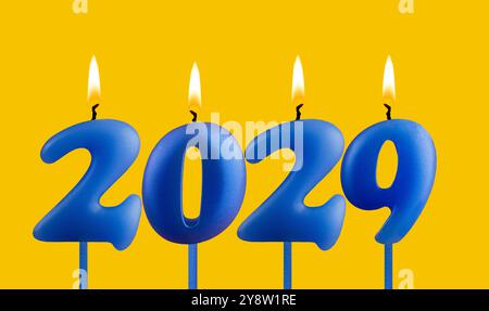 Happy New Year 2029 - Kerzen in Form von leuchtenden Zahlen Stockfoto