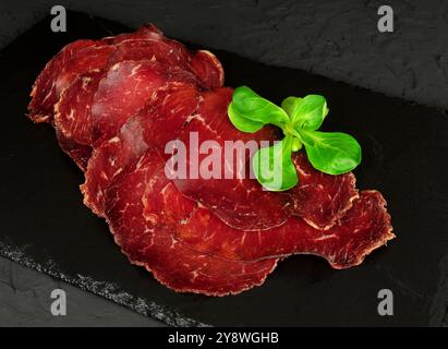 Bresaola Valtellina italienische luftgetrocknete Rindfleischscheiben Stockfoto