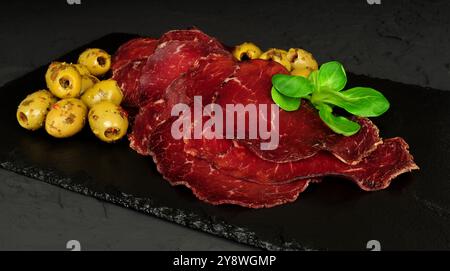 Bresaola Valtellina italienische luftgetrocknete Rindfleischscheiben Stockfoto