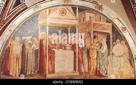 GIOTTO di Bondone (* 1267, Vespignano, d. 1337, Florenz) Szenen aus dem Leben des hl. Johannes des Täufers: 1. Verkündigung zu Zacharias 1320 Fresko, 280 x 450 cm Peruzzi Kapelle, Santa Croce, Florenz es ist schwer zu sagen, wie viel Nähe zwischen dem neuen Stil der Giotto Werkstatt und der Dekoration besteht. Von der Peruzzi-Kapelle in Santa Croce, die wahrscheinlich nicht lange nach den Arbeiten im Unteren Curch in Assisi durchgeführt wurde. Leider wurde der Peruzzi-Zyklus umfangreich neu bemalt, und die Überreste der ursprünglichen Fresken, die während einer kürzlichen Restaurierung entdeckt wurden, befinden sich in einem schlechten Zustand Stockfoto