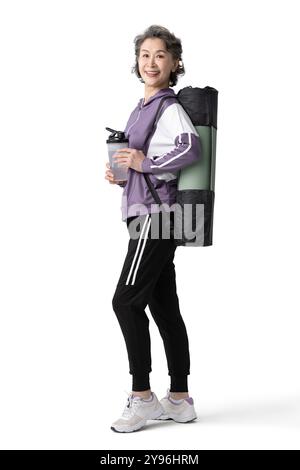 Glückliche Seniorin, die Sport macht Stockfoto