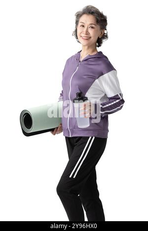 Glückliche Seniorin, die Sport macht Stockfoto