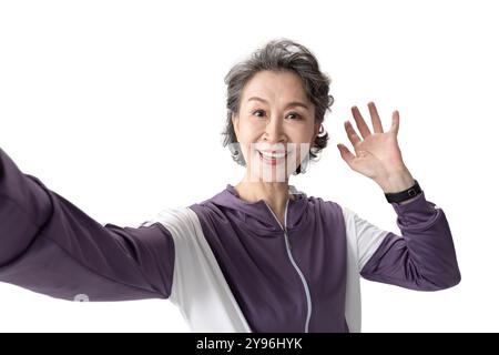 Glückliche Seniorin, die Sport macht Stockfoto
