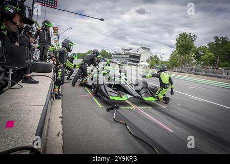 ROMAIN GROSJEAN (77) aus Genf, Schweiz, kommt während des XPEL Grand Prix an der Road America in Elkhart Lake, WI, die Grubenstraße runter Stockfoto