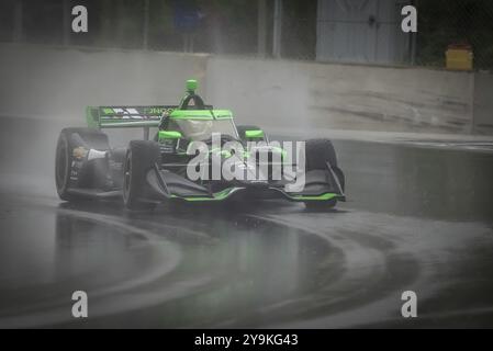 ROMAIN GROSJEAN (77) aus Genf, Schweiz, kommt durch Kurve 12 (Canada Corner) während eines Nasstrainings für den XPEL Grand Prix auf der Road Americ Stockfoto