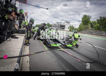 ROMAIN GROSJEAN (77) aus Genf, Schweiz, kommt während des XPEL Grand Prix an der Road America in Elkhart Lake, WI, die Grubenstraße runter Stockfoto