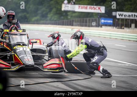 PIETRO FITTIPALDI (30) aus Miami, Florida, wird während des XPEL Grand Prix auf der Road America in Elkhart Lake, WI, die Grube entlang fahren Stockfoto