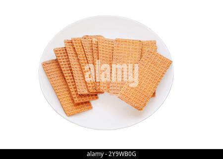 Waffeln mit Schokoladenüberzug. Verschiedene Waffeln auf Keramikplatte. Belgisches Dessert. Isolieren auf weißem Hintergrund. Stockfoto