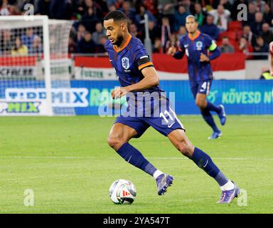 Budapest, Ungarn. Oktober 2024. Cody Gakpo aus den Niederlanden kontrolliert den Ball während des Spiels der UEFA Nations League 2024/25 League A zwischen Ungarn und den Niederlanden am 11. Oktober 2024 in Budapest. Quelle: Laszlo Szirtesi/Alamy Live News Stockfoto