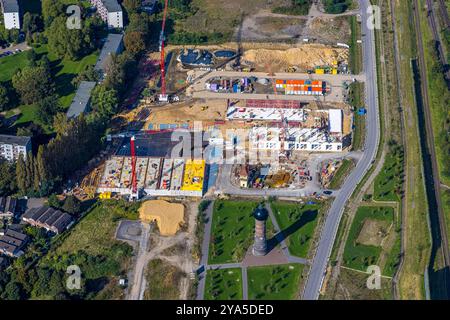 Luftbild, Baustelle mit Neubau am Wohnviertel Dirschauer Straße mit Wasserturm, geplante Duisburger Wohnquartier am ehemaligen Rangierbahnhof Wedau, Wedau, Duisburg, Ruhrgebiet, Nordrhein-Westfalen, Deutschland ACHTUNGxMINDESTHONORARx60xEURO *** Luftsicht, Baustelle mit Neubau an der Dirschauer Straße Wohngebiet mit Wasserturm, geplantes Duisburger Wohnquartier am ehemaligen Rangierbahnhof Wedau, Wedau, Duisburg, Ruhrgebiet, Nordrhein-Westfalen, Deutschland ACHTUNGxMINDESTHONORARx60xEURO Stockfoto