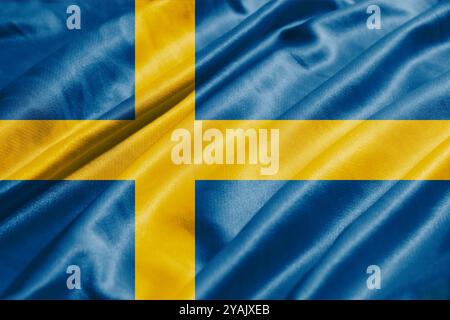 3D-Illustration einer schwedischen Satin-Flagge mit gewellter Stoffstruktur, Draufsicht. Stockfoto