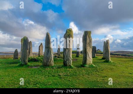 Die alten stehenden Steine von Callanish (oder Calanais) auf Lewis in den Äußeren Hebriden Schottlands bei Sonnenuntergang Stockfoto