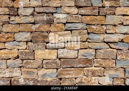 Blockmauerwand Nahaufnahme gemusterter strukturierter Hintergrund Stockfoto