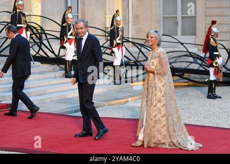 Frankreich. Oktober 2024. Bernard Arnault, Helene Mercier Arnault - der Präsident Emmanuel Macron empfängt den Staatsbesuch von seinen Majestäten, dem König und der Königin der Belgier, im Elysee-Palast in Paris, Frankreich. (Foto: Lionel Urman/SIPA USA) Credit: SIPA USA/Alamy Live News Stockfoto