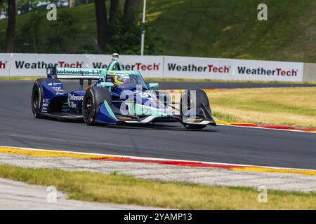 ROMAIN GROSJEAN (28) aus Genf, Schweiz, reist während eines Trainings für den Sonsio Grand Prix an der Road America im Elkhart Lake WI durch die Kurven Stockfoto