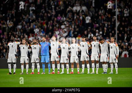 Schweigeminute Gedenkminute Trauer für Johan Neeskens und Dieter Burdenski deutsche Nationalmannschaft von links: Antonio Ruediger GER (02) Joshua Kimmich GER (06) Serge Gnabry GER (20) Torwart Oliver Baumann GER (01) Nico Schlotterbeck GER (15) Angelo Stiller GER (19) Florian Wirtz GER (17) Aledsandar Pavlovic GER (16) Tim Kleindienst Gamier (09) DFB LAENDERSPIEL DEUTSCHLAND GER VS NIEDERLANDE NED UEFA NATIONS LEAGUE 14.10.2024 DFL-VORSCHRIFTEN VERBIETEN DIE VERWENDUNG VON FOTOS ALS BILDSEQUENZEN UND/ODER QUASI-VIDEO Stockfoto