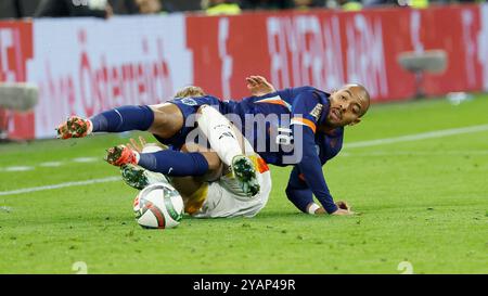 München, Deutschland. Oktober 2024. im Bild: V.l. Maximilian Mittelstaedt (Deutschland, 18) und Donyell Malen (Niederlande, 18), 14.10.2024, Fussball, UEFA Nations League, Deutschland - Niederlande, GER, München, Allianz-Arena. Quelle: dpa/Alamy Live News Stockfoto