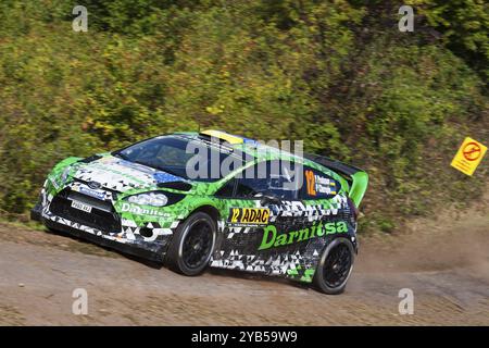 Yuriy Protasov und Pavlo Cherepin treten am 21. August 2014 in Trier, Germ, beim Shakedown der ADAC-Rallye Deutschland in ihrem Ford Fiesta RS WRC an Stockfoto