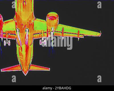 Flugzeug im Anflug, Ansicht von unten. Wärmebild oder Thermografie, Symbolfoto, interpoliert. Deutschland Stockfoto